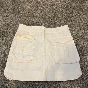 Elegant Cream Mini Skirt with Pockets